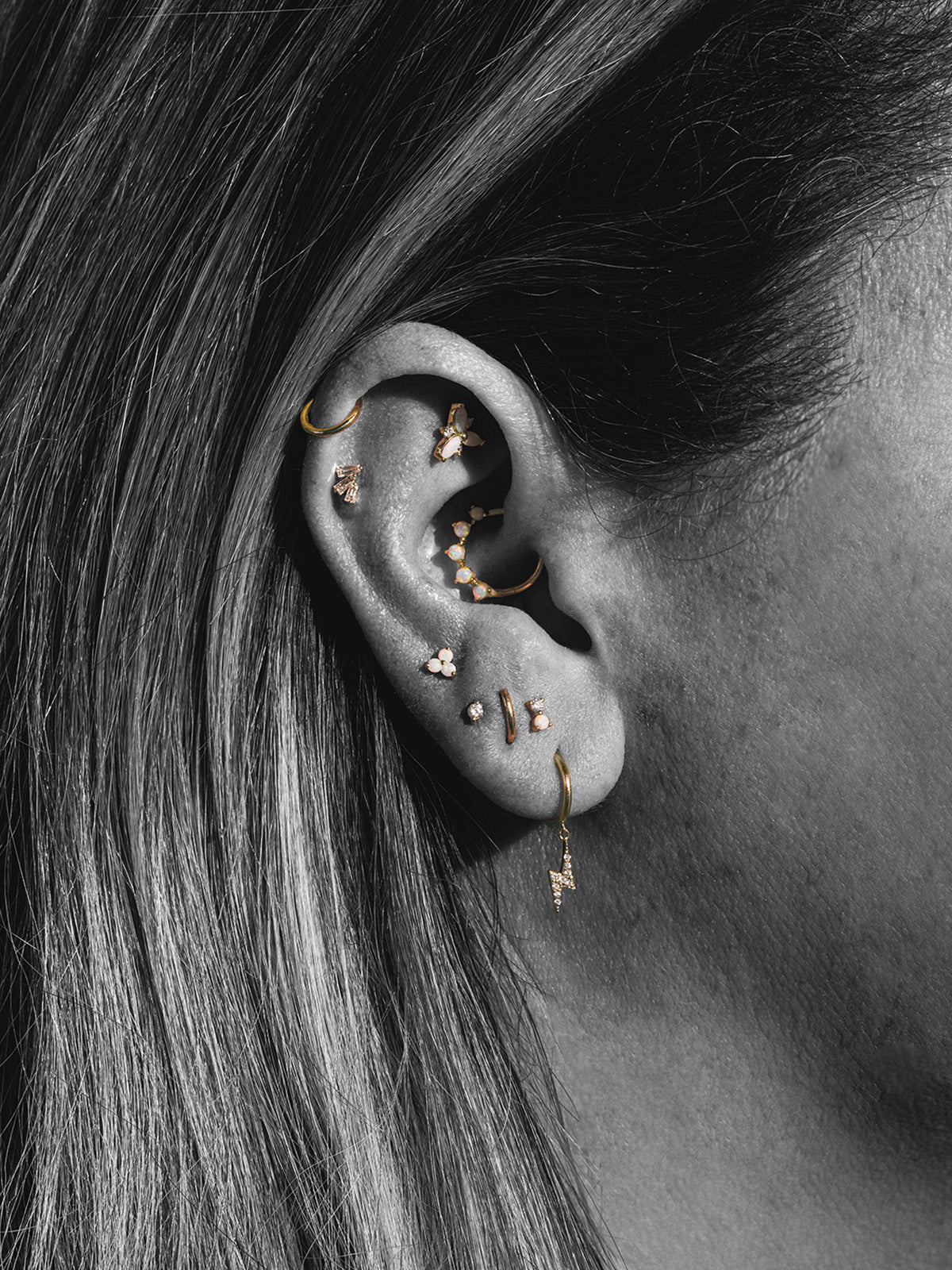 Three Graduated Diamond Baguette Yellow Gold Stud