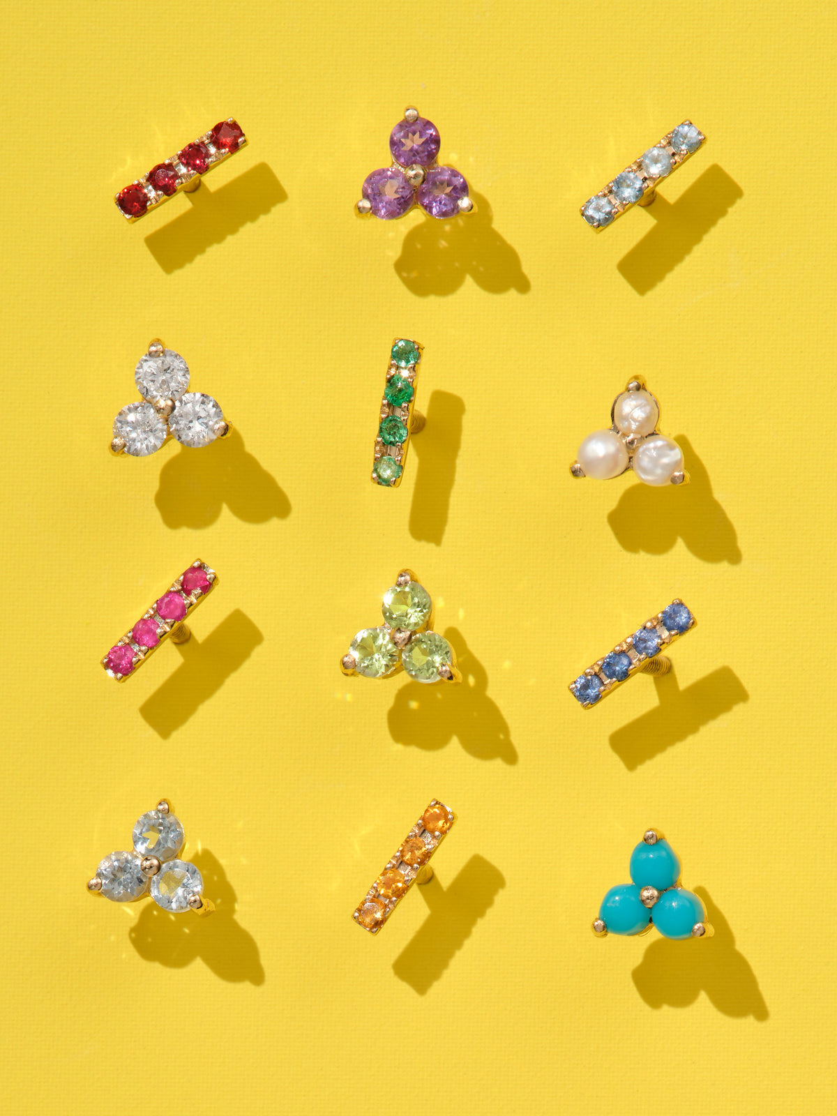 Tri-Ruby Yellow Gold Stud